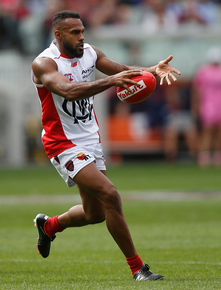 AFL 2016 Rd 02 - Melbourne v Essendon MELBOURNE, AUSTRALIA - APRIL 2: Heritier Lumumba of the Demons in action during the 2016 AFL Round 02 match between the Melbourne Demons and the Essendon Bombers at the Melbourne Cricket Ground, Melbourne on April 2, 2016. (Photo by Sean Garnsworthy/AFL Media)